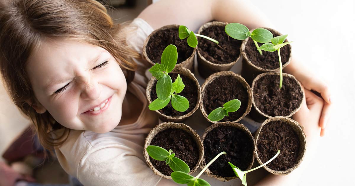Kid with seedlings
